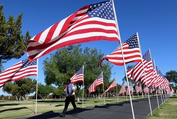 Over 1,000 American flags adorn the avenue of Grangeville Cemetery Monday on Memorial Day.